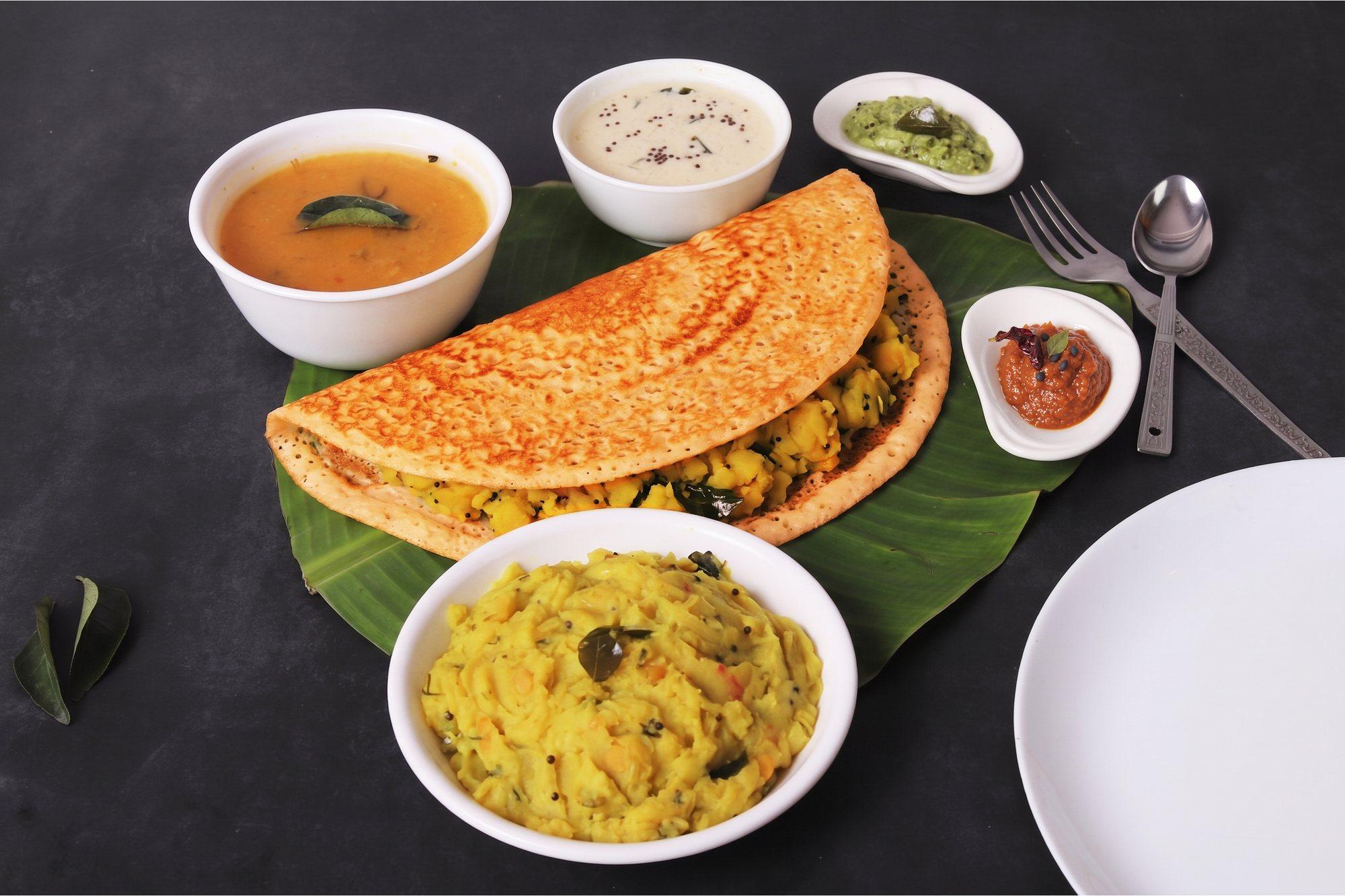 Crispy dosa with coconut chutney and sambar